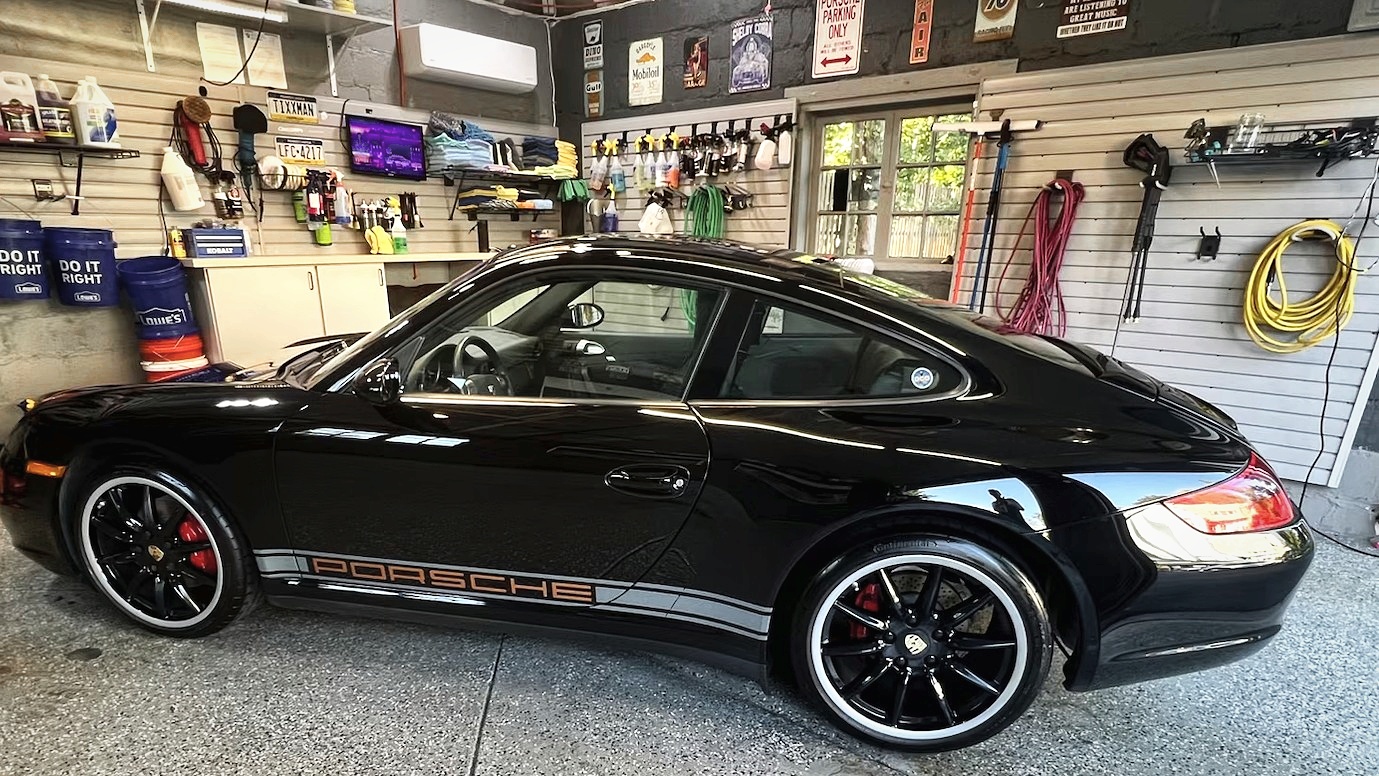 The Carrera 4 in a garage following professional paint correction